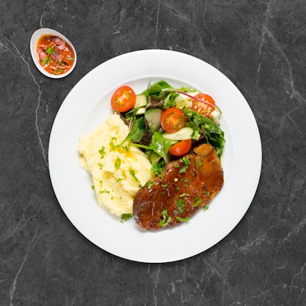 Slow-roasted pork neck with homemade adjika