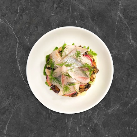 Herring with mushroom pillow