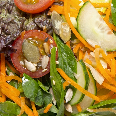 Fresh vegetable salad with carrots, seeds 