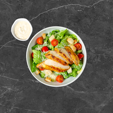 Caesar salad with grilled chicken breast